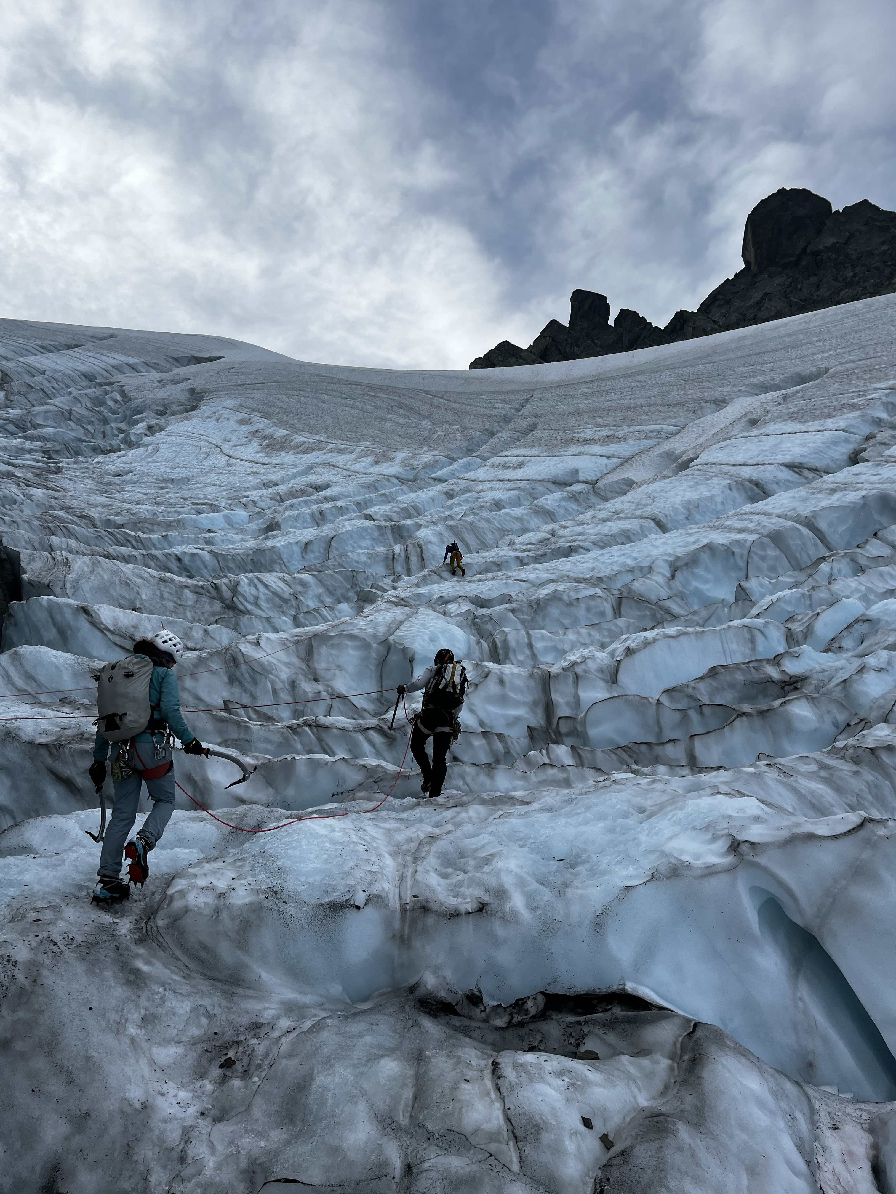Climbers cross a very crevassed section of glacier (Hell's Highway).